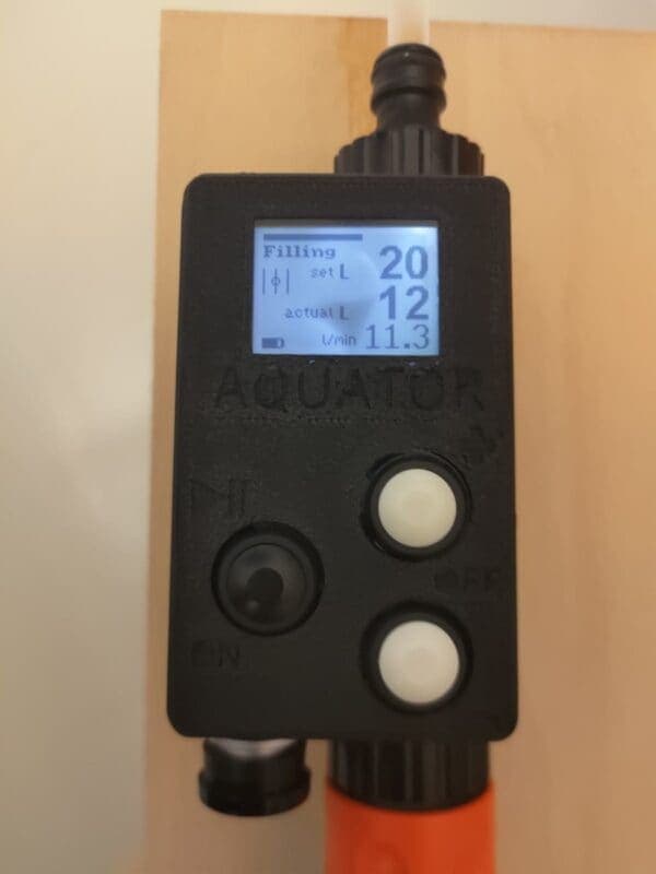 Aquator mounted and filling, the display showing set and actual litres