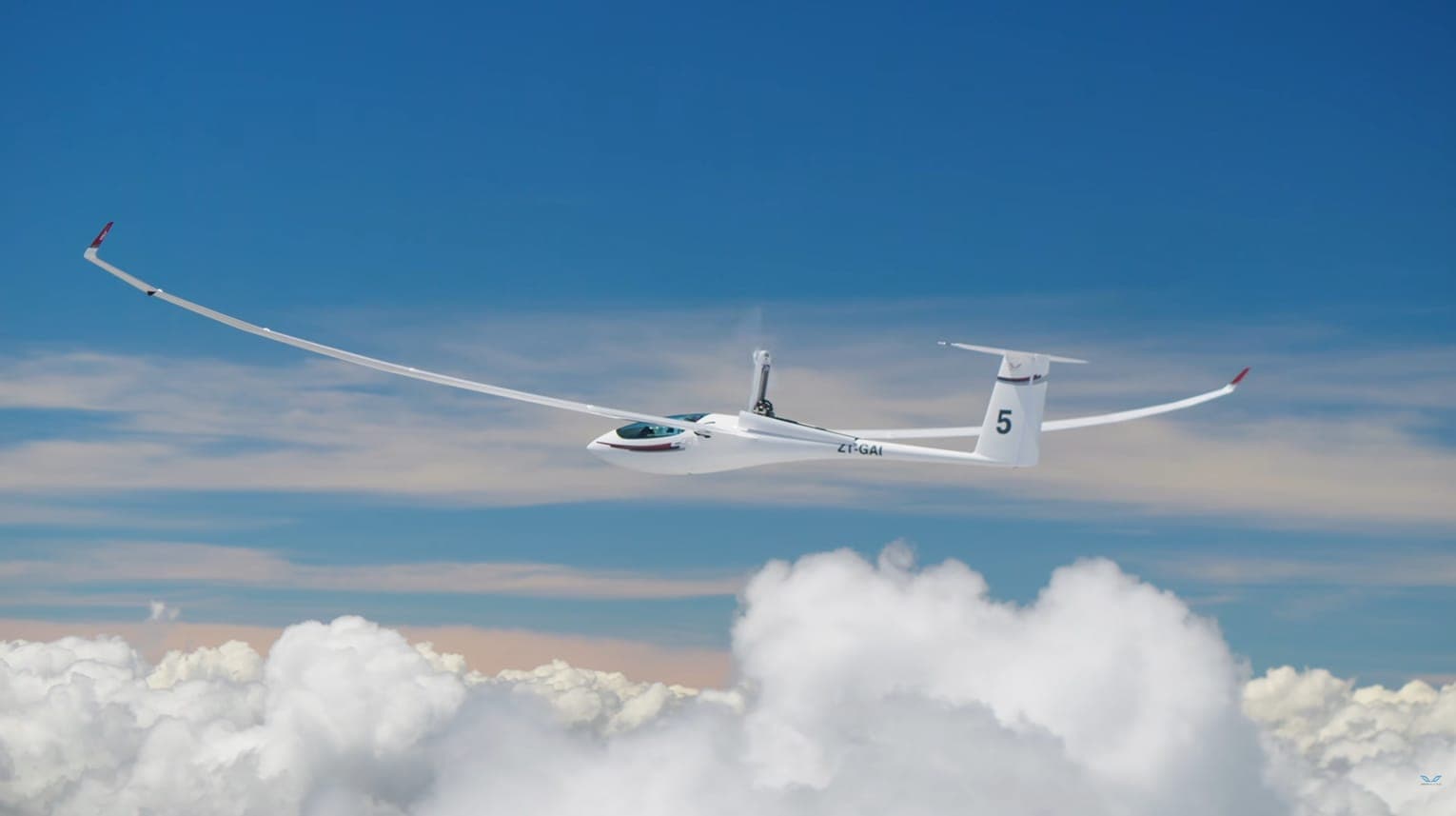 Ein JS5 Rey Offene-Klasse-Segelflugzeug über den Wolken
